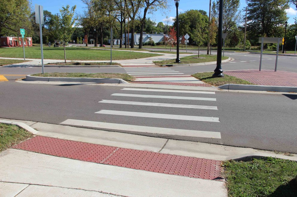 Kalamazoo Roundabout two lanes sidewalk pedestrian crossing view
